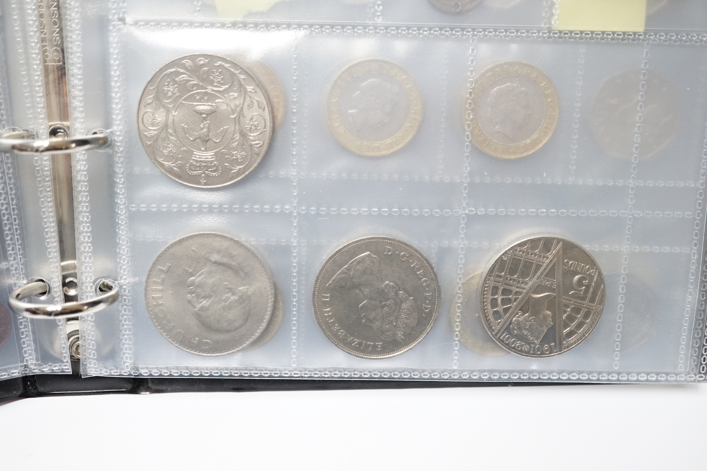 A stamp album, alphabetically mounted by country, mostly early 20th century, including some Commonwealth mounted mint, together with an album of mainly British coinage, 20th century, but includes two Roman AR denarius